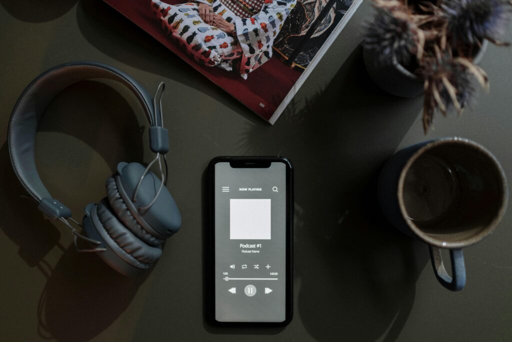 Overhead Shot of a Cellphone showing a Podcast Channel